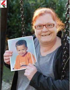 Dele Alli's Mother With A Dele's Childhood Image In Her Hand 